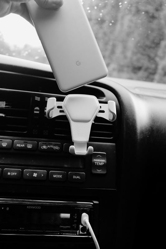 Black-and-white car interior image from an advertising campaign.
